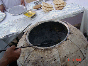 Baking bread in Pashkar, India